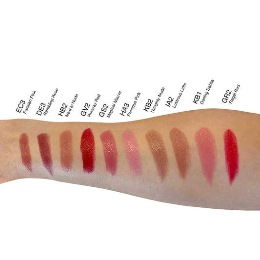 Pout Perfect luxury mauve lipstick swatches along with other shades on a forearm showing creamy texture