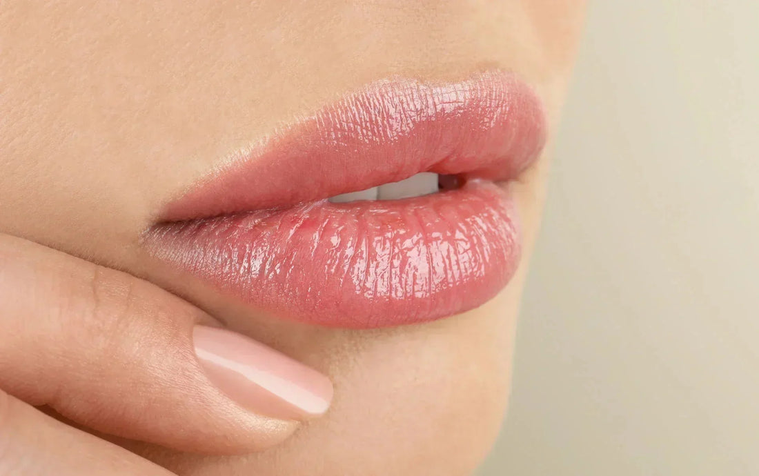 Close-up of smooth lips with glossy finish illustrating a lip care routine for healthy lips