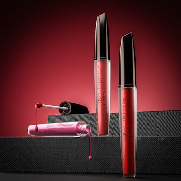 Red liquid lipstick bottles with applicator