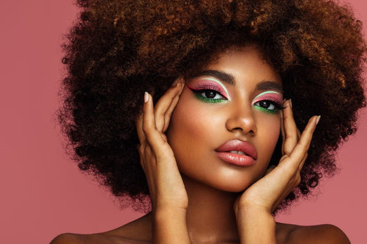 Close-up of woman with bold makeup demonstrating how to choose the right lip shade for her complexion
