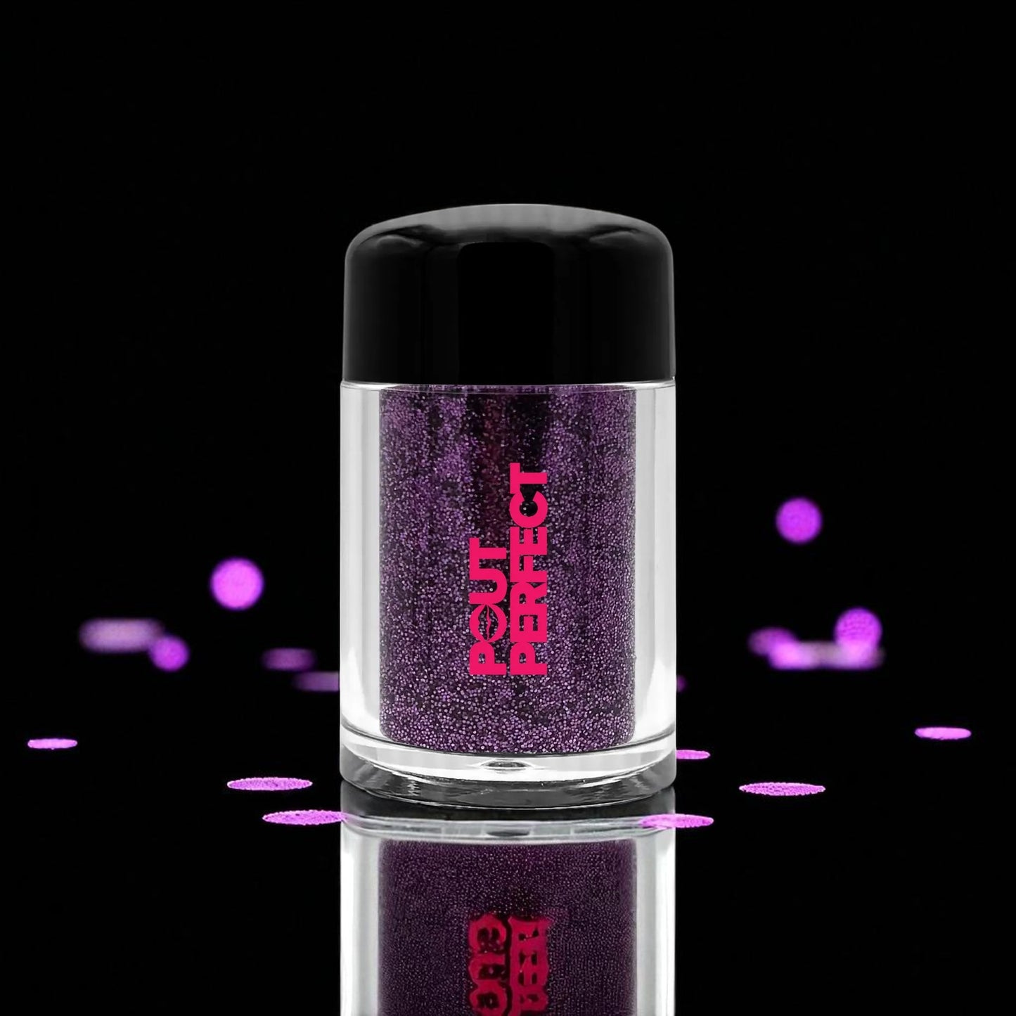 Pout Perfect amethyst glitter lip dust in clear jar with black lid against black background