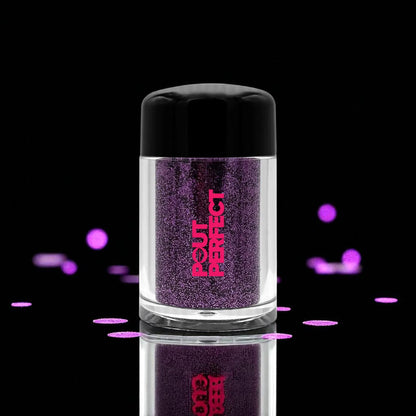 Pout Perfect amethyst glitter lip dust in clear jar with black lid against black background