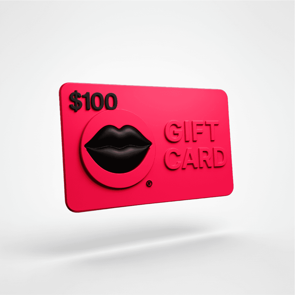 A bright pink $100 gift card with a raised black lips emblem and embossed 'GIFT CARD' text, shown floating on a light gray background. Shop e-Gift Cards