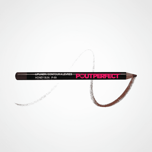 A Pout Perfect lip liner pencil in the shade Honey Bun, shown horizontally on a clean white background with a textured swipe of the brown lip color behind it. Honeybun