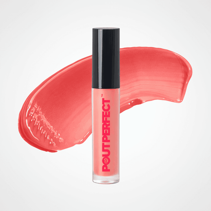 A tube of POUT PERFECT liquid lipstick in a coral pink shade with a black cap, set against a matching coral pink cosmetic swatch on a light gray background. Chestnut