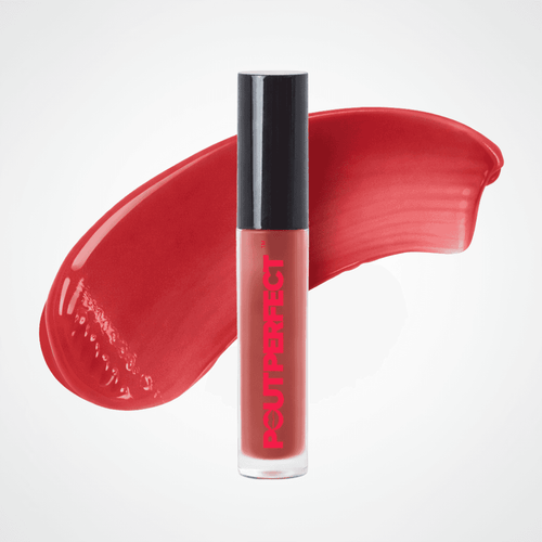 A tube of Pout Perfect liquid lipstick in a vibrant red shade, standing upright in front of a matching glossy red color smear on a light gray background. Warm Rose