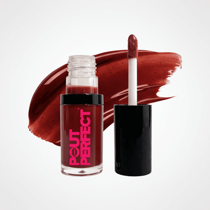 A bottle of Couture Perfect liquid lipstick with its cap off, showing the applicator wand with product on it, set against a white background with a large swipe of the deep berry-red lipstick color. Rosewood