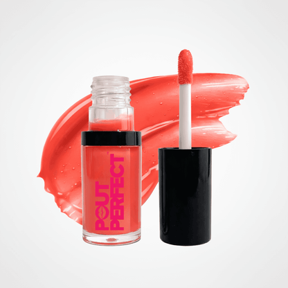A bottle of Couture Perfect liquid lipstick with its applicator wand shown next to it, set against a white background with a vibrant coral-pink lipstick smear behind them. Sheer Red