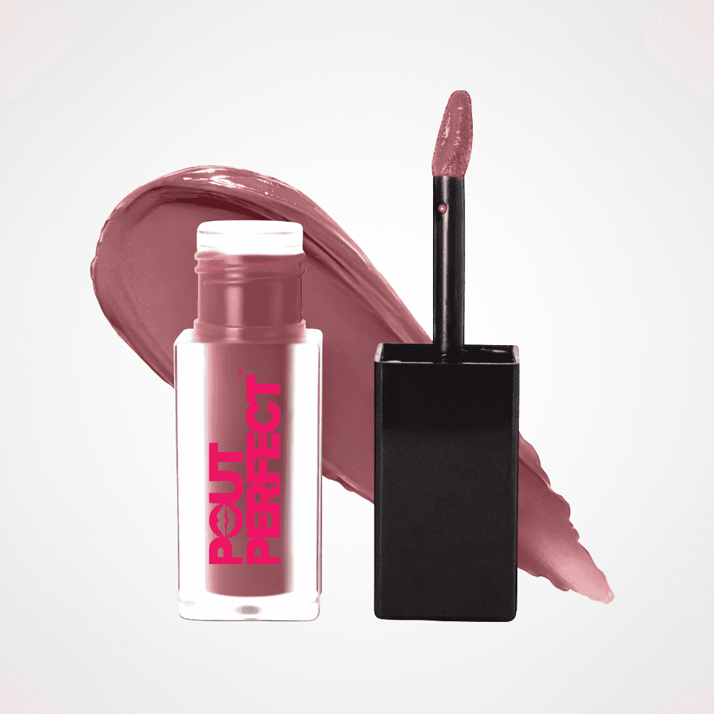 A bottle of Bout de Perfect liquid lipstick with a black applicator wand, shown next to a large swipe of the dusty rose pink formula on a clean white background. Blackberry Wine