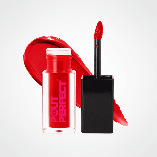 A bottle of red liquid lipstick with a black applicator wand, shown next to a large red color swatch on a clean white background. The brand name 'POUT PERFECT' is printed vertically on the bottle. Velvet Red