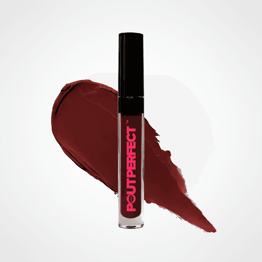 A clear tube of Peutperfect liquid lipstick with a black cap, standing in front of a large deep berry-brown color swatch on a light gray background. Vixen
