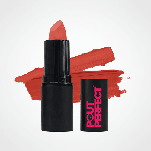 A black lipstick tube with a coral-red lipstick bullet exposed, shown next to its matching black cap printed with pink 'POUT PERFECT' branding. A coral-red lipstick swatch is painted behind the product on a clean white background. Creamy Mauve