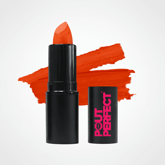 An orange-red lipstick in a black tube stands next to its matching black cap, which features pink 'POUT PERFECT' branding. A matching orange-red lipstick smear is displayed behind the product on a clean white background. Fire Cracker Red