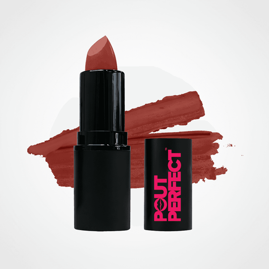 A black lipstick tube with a warm reddish-brown lipstick bullet standing next to its matching black cap, which features the brand name 'POUT PERFECT' in pink. A textured swipe of the lipstick color is displayed in the background on a clean white studio backdrop. Plum Wine