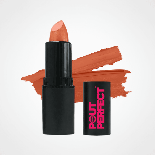 A black lipstick tube with a peachy nude lipstick bullet standing upright, alongside its matching black cap printed with pink 'OUT PERFECT' branding. A textured orange-brown lipstick swatch is displayed behind the products on a clean white background. Spicy Rum