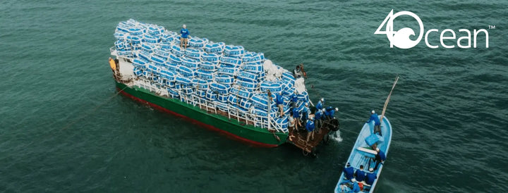 Boat loaded with bags of collected ocean plastic highlighting ocean plastic removal services by Ecodrive
