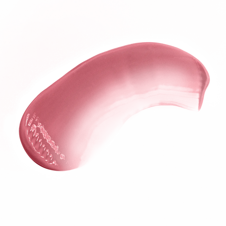 Pout Perfect classic sienna lip gloss smear showing smooth and glossy texture on black background