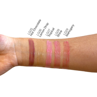Pout Perfect hot chocolate lip gloss swatch on arm along with four other shades for color comparison
