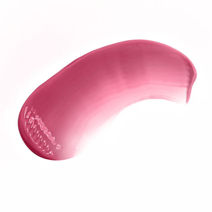 Pink swatch of luxury lip gloss made in USA by Pout Perfect with smooth glossy texture