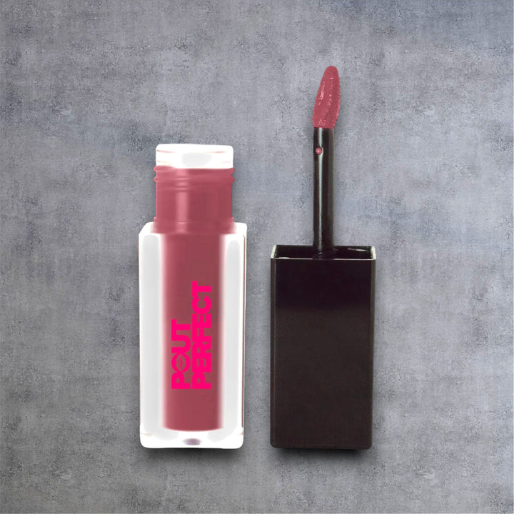 Pout Perfect matte lip stain twilight with applicator showing deep mauve color on gray background
