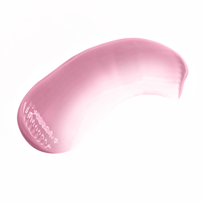 Pink lip kit swatch by Pout Perfect showing smooth creamy texture on black background