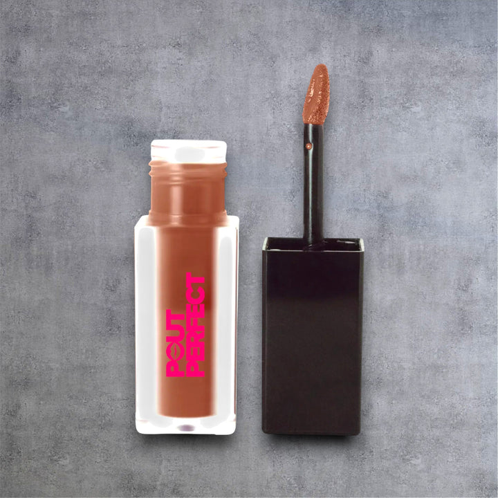 Pout Perfect cocoa matte lip stain with applicator wand on a gray background