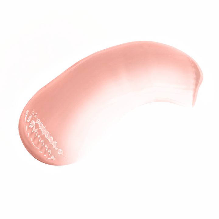Smooth swatch of Pout Perfect coral lip gloss with a shiny creamy texture on black background