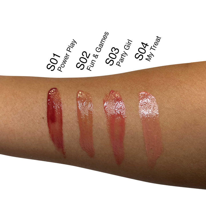 Pout Perfect hydrating lip oil set with four shades swatched on arm in Power Play, Fun & Games, Party Girl, and My Treat