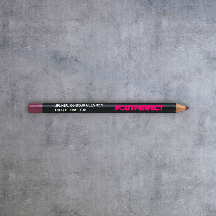 Pout Perfect precision lip liner antique rose pencil on gray surface for lip contouring