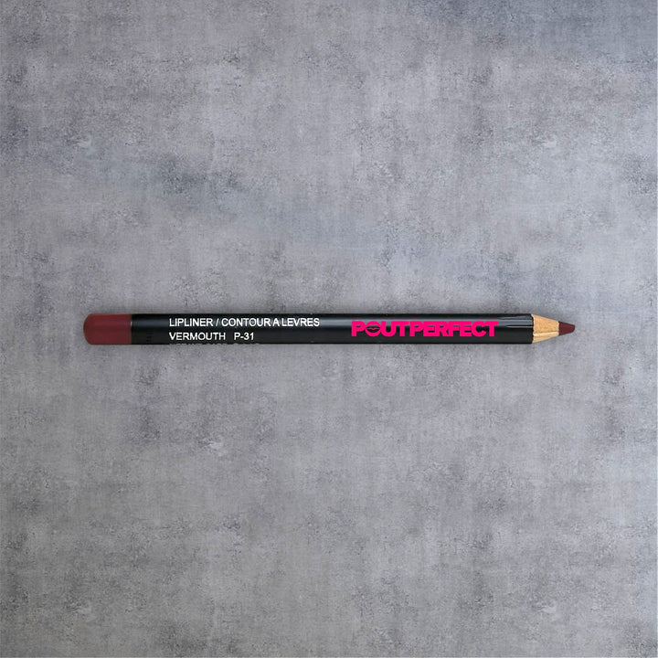 Pout Perfect precision lip liner vermouth pencil in dark red shade on gray background